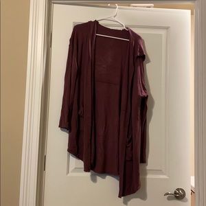 Long sleeve sweater with hood.